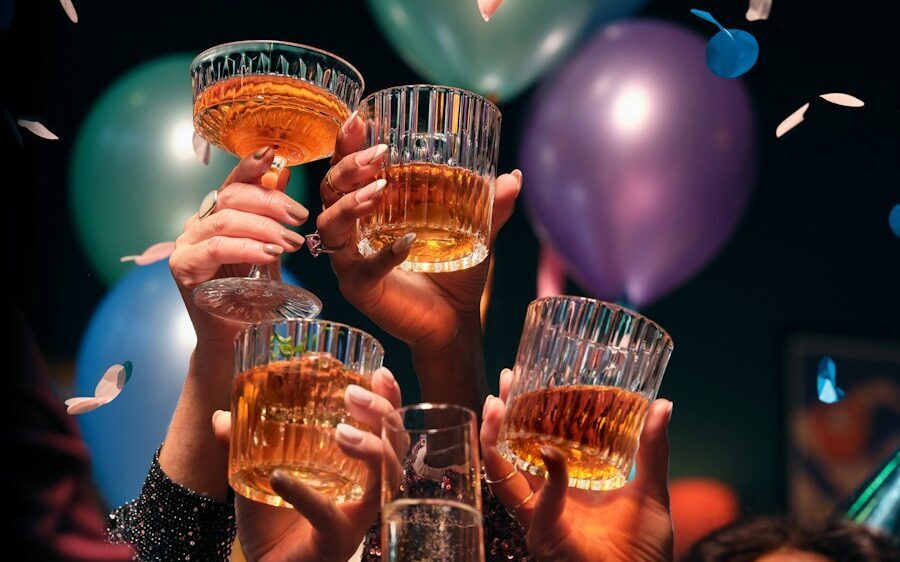 a group of people holding up glasses of wine